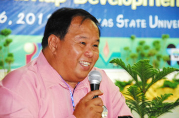 Dr. Jose  L. Bacusmo,VSU  president , delivering his message at the opening ceremonies of the Jackfruit FIESTA on August 6  at VSU’s Convention Center, Visca, Baybay, Leyte. (Photo and text by April Rose A. Itchon, S&T Media Service)