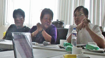 Executive Director Jovita M. Corpuz (middle) actively provides comments during the consultation meeting. Present during the meeting were Dr. Ernesto O. Brown (left) and Dr. Albert P. Aquino (right) of SERD-PCAARRD.