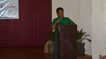 Dr. Patricio S. Faylon as he delivers his message before a group of students and faculty members at the Western Mindanao State University, San Ramon Campus.