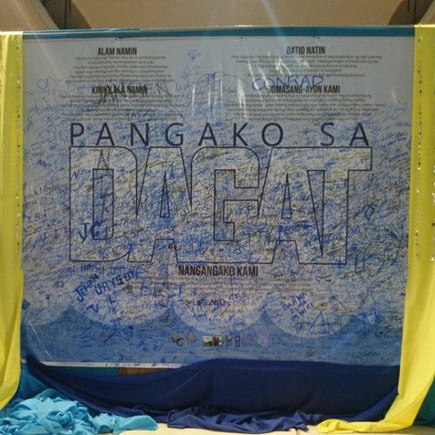 Photo of the Pangako sa Dagat pledge wall after being signed by the attendees of the Sardines Festival.